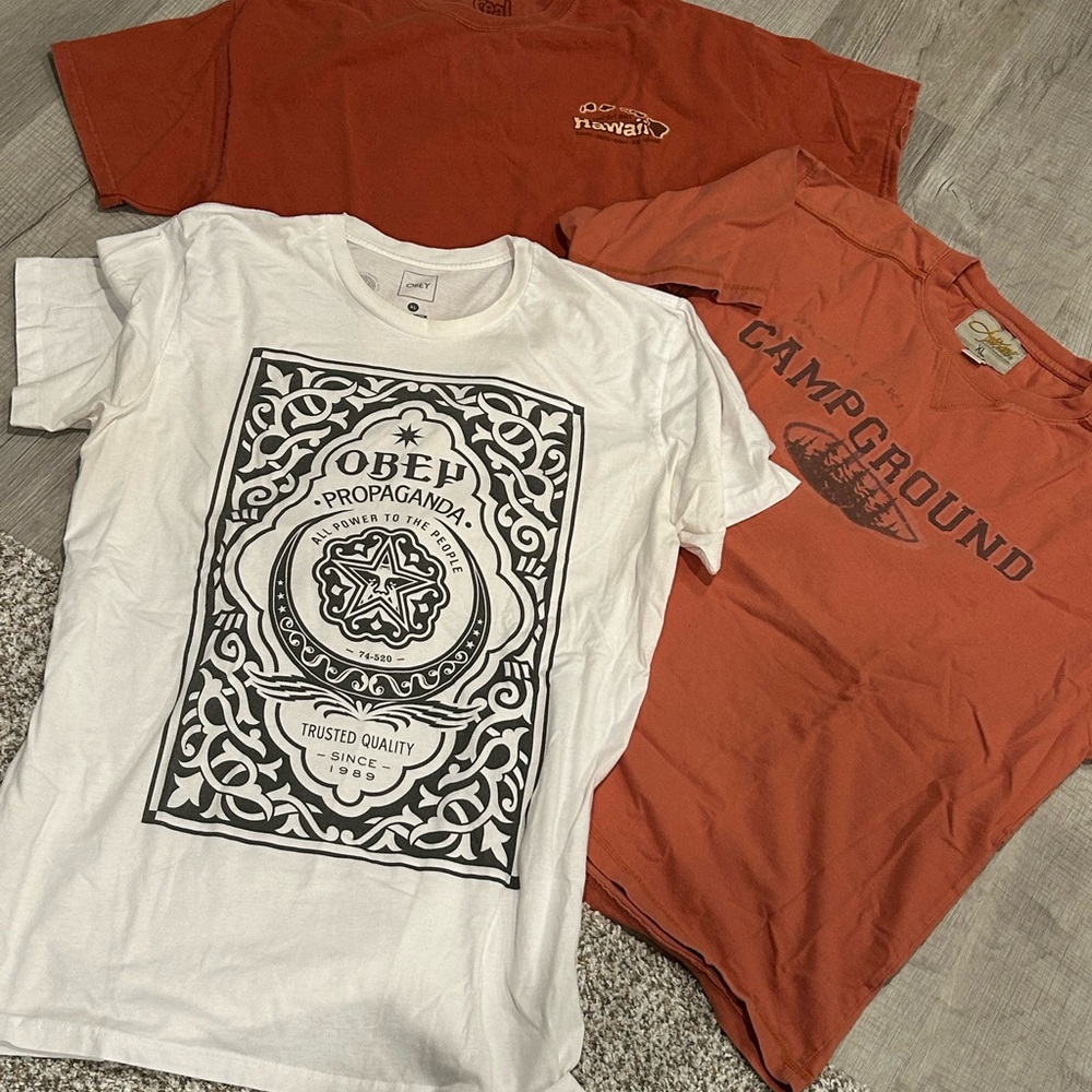Obey White Tee with Black Design and Two Orange Graphic Tees